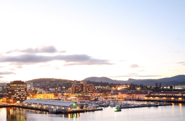Aerial shot of the Hobart waterfront facing north west, hobart marina and city skyline