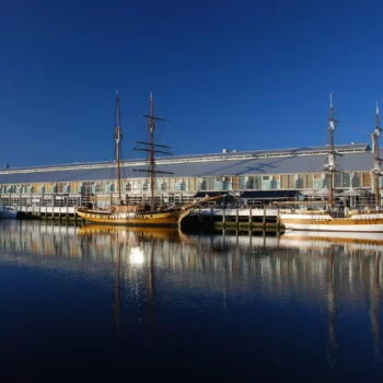 Elizabeth Street Pier, 2 historic tall ships attached to the converted storage pier structure, with accommodation and restaurants
