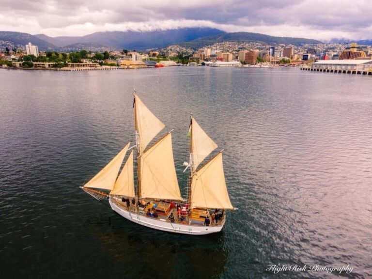 Aerial shot of the S.V. Rhona wooden sailing boat in the Derwent river Hobart, Tasmania